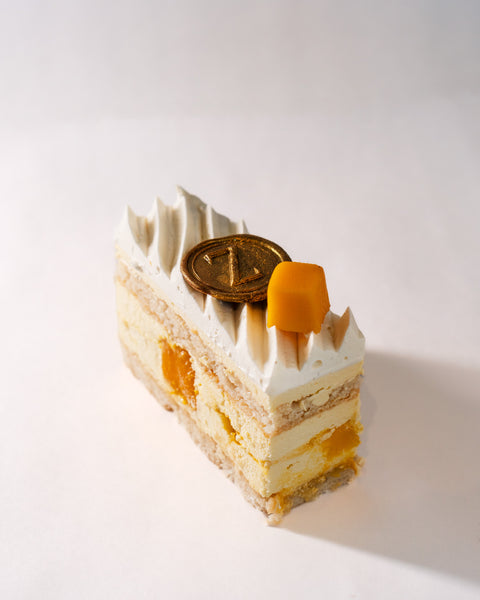 Almond Dacquoise, Mango Compote & Light Cream
