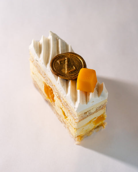 Almond Dacquoise, Mango Compote & Light Cream