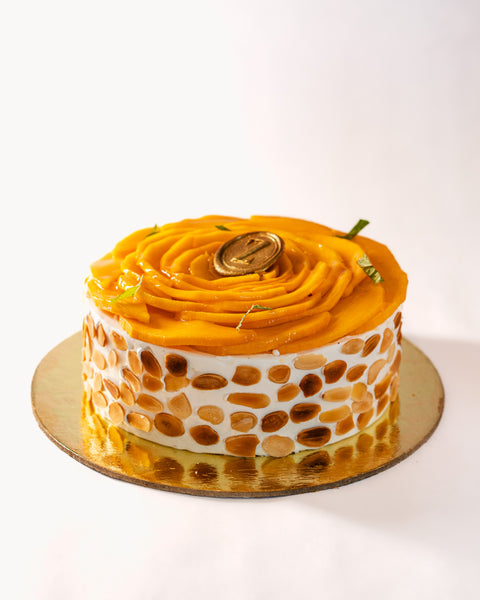Almond Dacquoise, Mango Compote & Light Cream Cake