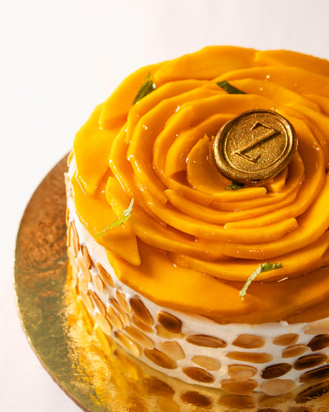Almond Dacquoise, Mango Compote & Light Cream Cake