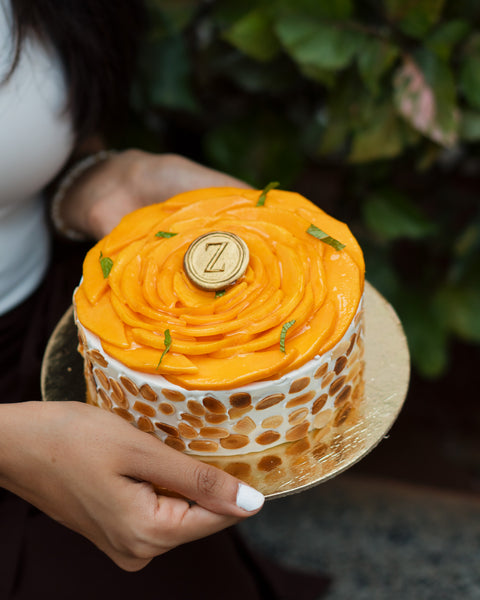 Almond Dacquoise, Mango Compote & Light Cream Cake